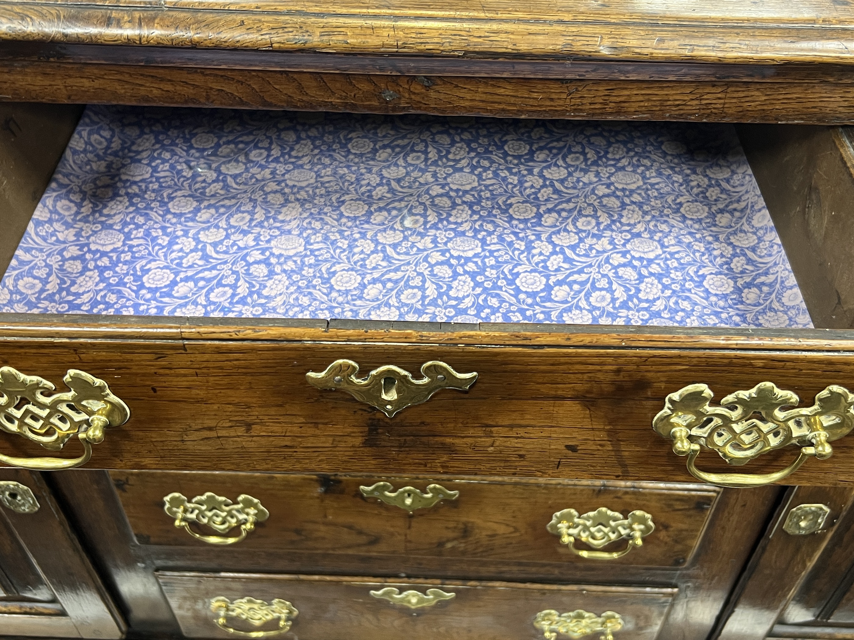 An 18th century oak low dresser, width 192cm, depth 51cm, height 89cm